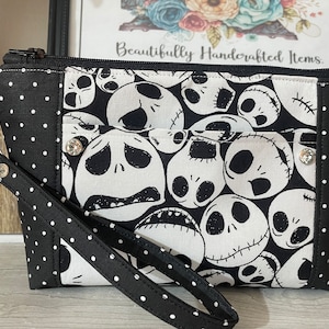 Cartera de pulsera confeccionada con tejido con licencia de Pesadilla antes de Navidad