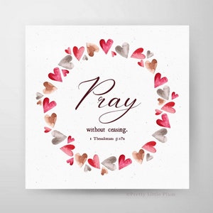 May include: A watercolour illustration of a wreath of hearts with the words "Pray without ceasing. 1 Thessalonians 5:17" in a cursive font. The background is a light beige.