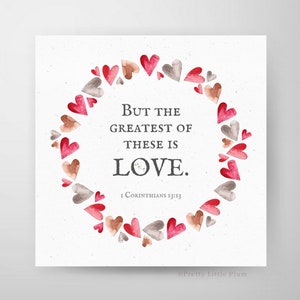 May include: A watercolor illustration of a heart wreath with the quote "But the greatest of these is LOVE. 1 Corinthians 13:13" in black text.
