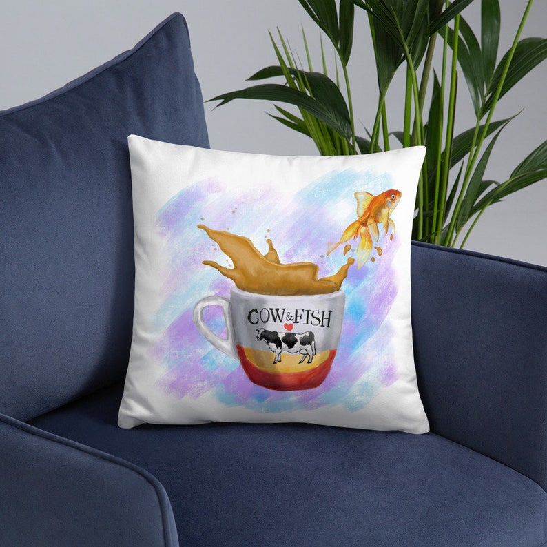 Goldfish jumping from a cup of milk tea Basic Pillow image 6