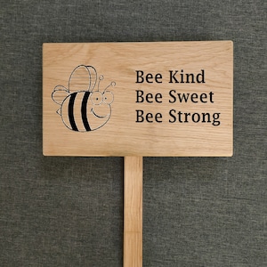 Personalised Oak garden signs with a 25cm ground stake attached