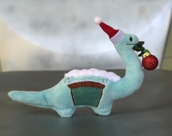 Mini peluche di Gertie, il dinosauro degli Hollywood Studios (o MGM). Un peluche dell'estinzione!