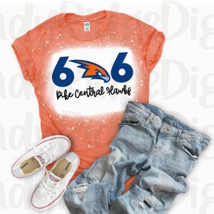May include: Orange bleached t-shirt with a blue and orange graphic of a hawk with the text "646 Pike Central Hawks".