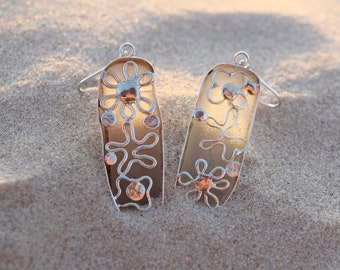 Sea glass earrings with flowers in white set in silver. Genuine sea glass jewelry. Ocean lover gift. Floral beach jewelry.