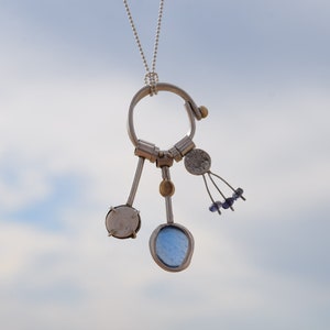 Sea glass necklace in blue with elements in silver and gold. Genuine sea glass necklace. Beach glass necklace. Ocean lovers gift. Upcycled