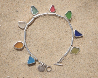 Sea glass bracelet in rainbow set in silver. Genuine sea glass bracelet. Kinetic bracelet. Ocean lover gift. Rainbow lover gift. Upycled