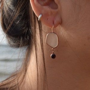 Sea glass earrings in white with garnet set in rose gold. Sea glass earrings solid gold. Genuine sea glass earrings in red gold. Upcycled image 2