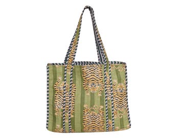 May include: A green tote bag with a repeating tiger pattern in shades of yellow and black. The bag has vertical stripes and a striped border. The handles are green with a black and white striped pattern.