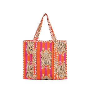May include: A vibrant tote bag featuring a repeating tiger pattern on a striped background of orange and pink. The bag has matching orange handles and white trim. The tote is designed for carrying items.