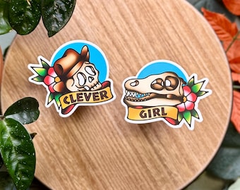 Clever Girl Matte Waterproof Vinyl Sticker Set, Dinosaur Lover, 90s Movie, American Traditional Tattoo Style, Two Sticker Pack