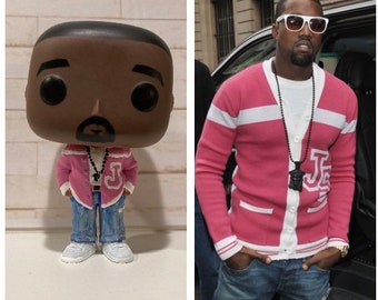 Funko de Kanye con cárdigan rosa