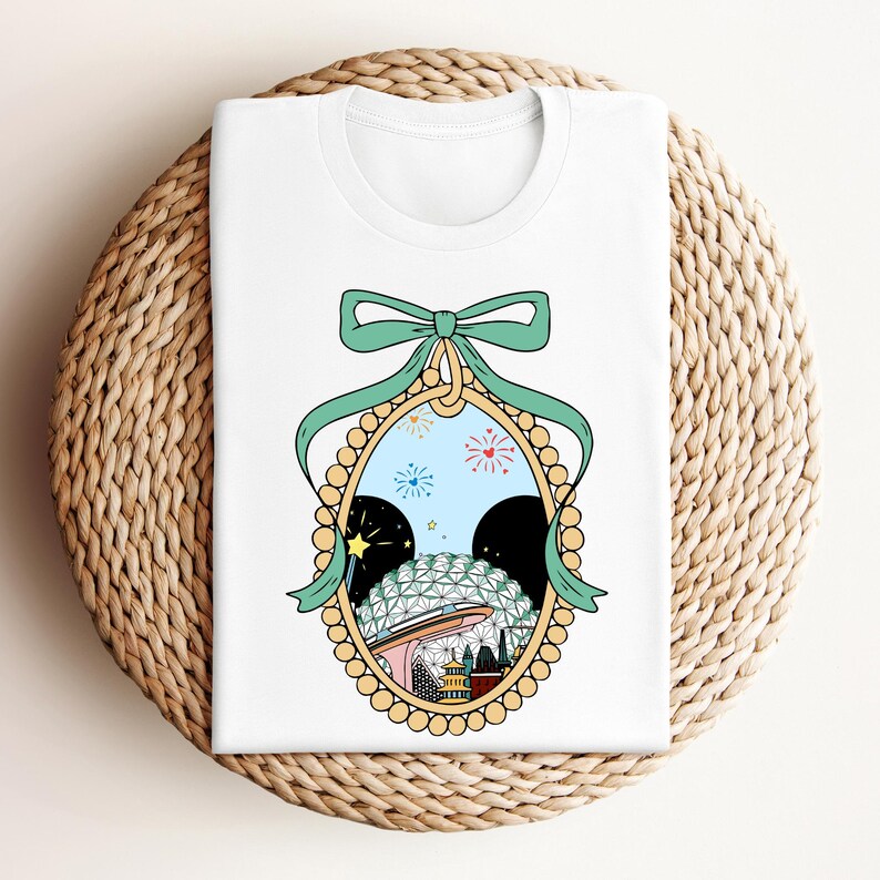 a white t - shirt with a picture of a woman's face in a