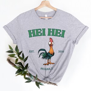 a t - shirt with a picture of a rooster on it