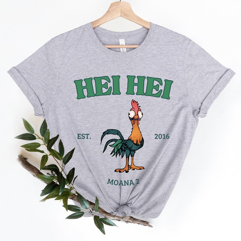 a t - shirt with a picture of a rooster on it