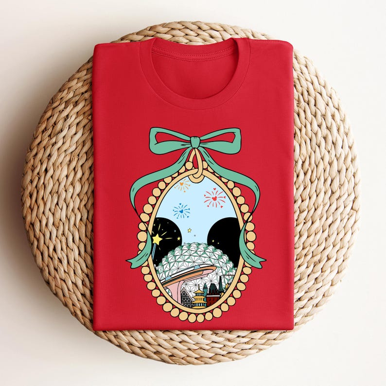 a red t - shirt with a picture of a woman's face in a