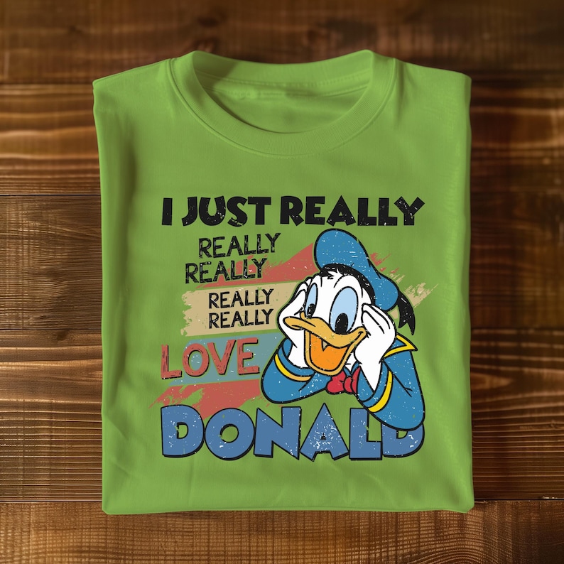 a green t - shirt with a cartoon character saying i just really really really really
