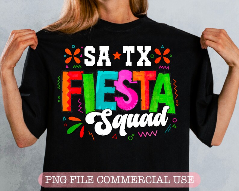 May include: Black t-shirt with a colorful graphic design that says "SA TX FIESTA Squad".