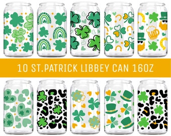 May include: Ten clear glass 16 oz. cans with different St. Patrick's Day themed designs. The designs include shamrocks, hearts, rainbows, leprechauns, and beer mugs.