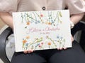 Custom Embroidered Linen Wedding Guest Book, Personalized A4 Landscape Notebook, Hand Embroidered Flowers Memory Book, Hardbound Scrapbook product logo