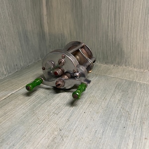 Vintage Pflueger Supreme 510 Bait Casting Reel. Super nice condition. on  eBid United States