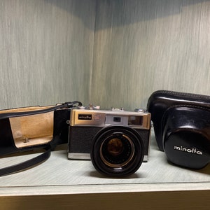 Minolta Super 3 Circuit Hi-Matic 11 Camera with Minolta Leather Case and Strap