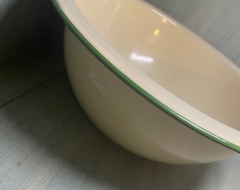 Green edged enamel bowl.