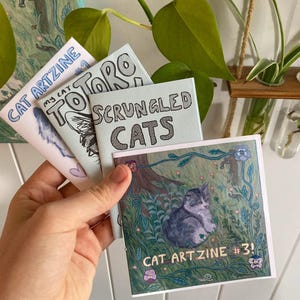cat artzine bundle! includes four cat-themed zines :-)