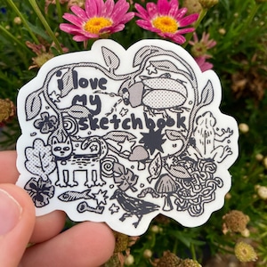 ik hou van mijn schetsboek: glanzende zwart-witvinylsticker voor schetsboeken