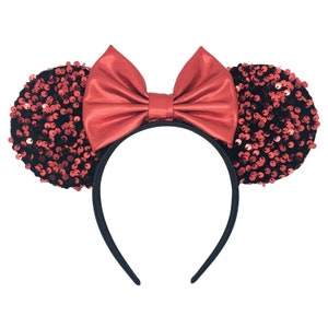 May include: Red sequined mouse ears headband with a large red satin bow.