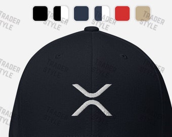 May include: A navy blue baseball cap with a white embroidered X-shaped logo. The logo is a stylized representation of the cryptocurrency XRP.