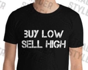May include: A black t-shirt with the text "BUY LOW SELL HIGH" in white, distressed lettering.
