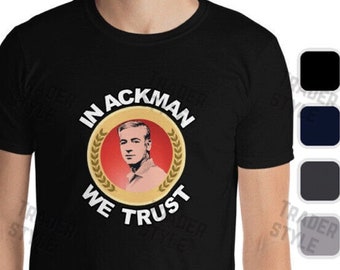 May include: Black t-shirt with a gold circle graphic featuring a man's face and the text "In Ackman We Trust".