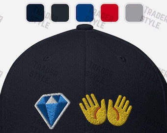 May include: A navy blue baseball cap with a diamond and two yellow hands embroidered on the front.