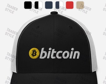 May include: A black and white trucker hat with a yellow bitcoin symbol and the word "bitcoin" embroidered in white on the front.