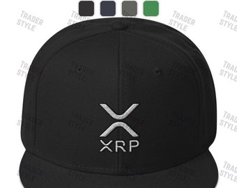 May include: A black and white embroidered XRP logo on a black baseball cap.
