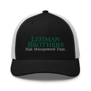 May include: Black and white trucker hat with a green embroidered logo that says "LEHMAN BROTHERS Risk Management Dept."