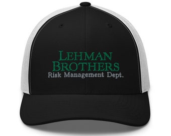 May include: Black and white trucker hat with a green embroidered logo that says "LEHMAN BROTHERS Risk Management Dept."