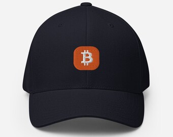 May include: A navy blue baseball cap with an orange embroidered Bitcoin logo.