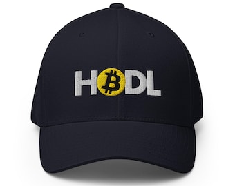 May include: A navy blue baseball cap with a white embroidered Bitcoin logo and the word "HODL" in white.