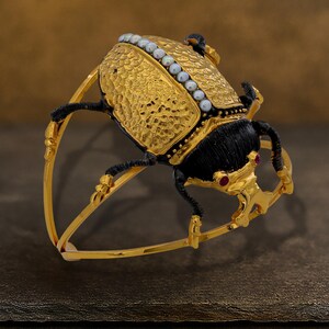 Scarab Beetle Cuff Bracelet – Gold Plated with Ruby Eyes and Pearl Accent
