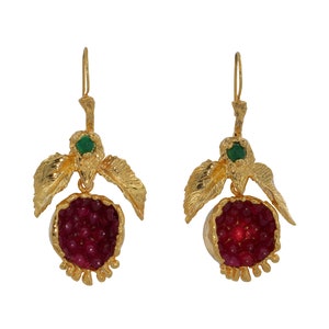 May include: Gold earrings shaped like pomegranates with red and green enamel details.