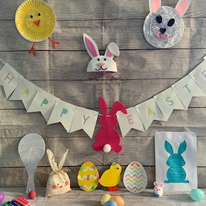 May include: Easter craft supplies including a bunny rabbit stencil, felt bunny rabbit, paper plate chick, paper plate bunny, egg-shaped craft supplies, and a banner that reads "Happy Easter".