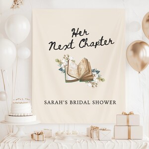 May include: A cream-colored banner with the text "Her Next Chapter" and "SARAH'S BRIDAL SHOWER" in black script. An open book illustration with floral accents is centered. White and gold balloons, a cake, and gifts are in the foreground.
