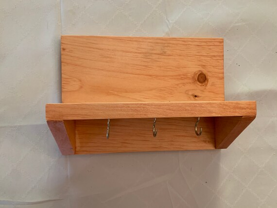 Wood entry door key holder