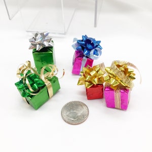5 miniature wrapped gifts assorted colors and sizes foil wrapping