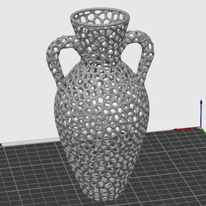 May include: A gray ceramic vase with a decorative openwork design. The vase has two handles and a round body.