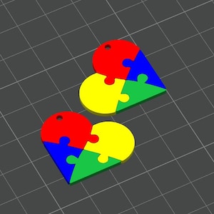 May include: Two heart-shaped puzzle pieces, each made up of four puzzle pieces in red, yellow, blue, and green.