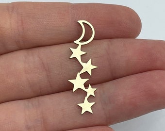 May include: A gold-toned metal earring featuring a crescent moon shape at the top, followed by a vertical arrangement of four five-pointed stars of varying sizes that cascade downwards in a linear, connected design.
