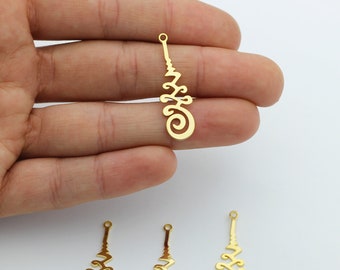 May include: Four gold-coloured metal charms with a decorative design. The charms are shaped like a spire with a spiral at the bottom. Each charm has a small loop at the top for attaching to a necklace or bracelet.