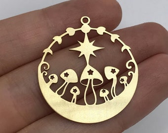 May include: Gold-toned metal charm featuring a circular design with a star and mushrooms. The charm has a cutout design and is perfect for jewelry making.